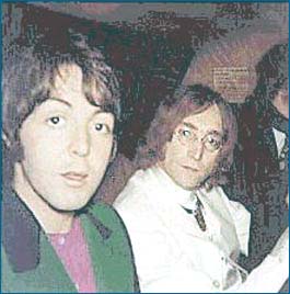 1: A candid photo of John Lennon and Paul McCartney taken while they were on their way to America in 1968 to promote Apple Corps.